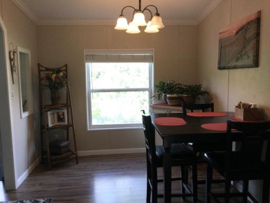 Move right into this beautifully updated home tucked back into a on Spanish Lakes I in Florida - for sale on GolfHomes.com, golf home, golf lot