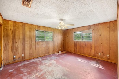 Located on a large corner lot this property is ready for its on Hearne Municipal Golf Course in Texas - for sale on GolfHomes.com, golf home, golf lot