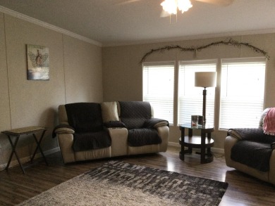 Move right into this beautifully updated home tucked back into a on Spanish Lakes I in Florida - for sale on GolfHomes.com, golf home, golf lot