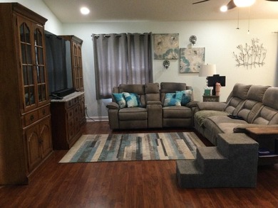 Nicely maintained concrete block home in the much sought after on Spanish Lakes I in Florida - for sale on GolfHomes.com, golf home, golf lot