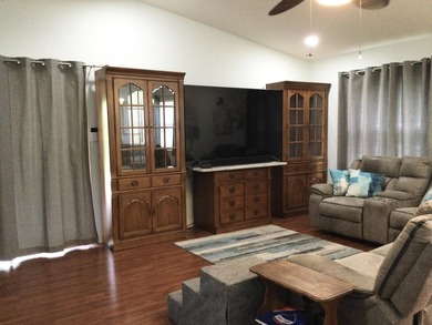 Nicely maintained concrete block home in the much sought after on Spanish Lakes I in Florida - for sale on GolfHomes.com, golf home, golf lot