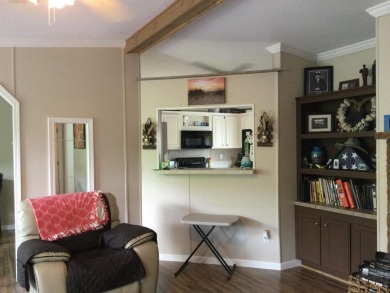 Move right into this beautifully updated home tucked back into a on Spanish Lakes I in Florida - for sale on GolfHomes.com, golf home, golf lot