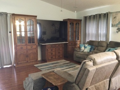 Nicely maintained concrete block home in the much sought after on Spanish Lakes I in Florida - for sale on GolfHomes.com, golf home, golf lot