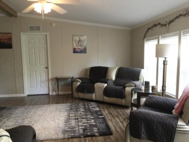 Move right into this beautifully updated home tucked back into a on Spanish Lakes I in Florida - for sale on GolfHomes.com, golf home, golf lot