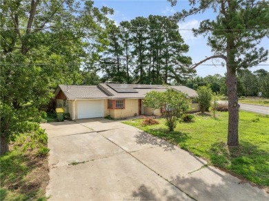 Located on a large corner lot this property is ready for its on Hearne Municipal Golf Course in Texas - for sale on GolfHomes.com, golf home, golf lot