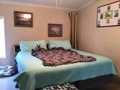 Move right into this beautifully updated home tucked back into a on Spanish Lakes I in Florida - for sale on GolfHomes.com, golf home, golf lot