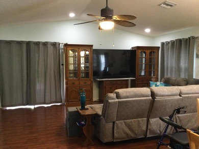 Nicely maintained concrete block home in the much sought after on Spanish Lakes I in Florida - for sale on GolfHomes.com, golf home, golf lot