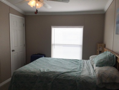Move right into this beautifully updated home tucked back into a on Spanish Lakes I in Florida - for sale on GolfHomes.com, golf home, golf lot