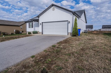 Discover modern comfort and effortless convenience in this on Franklin Country Club in Kentucky - for sale on GolfHomes.com, golf home, golf lot