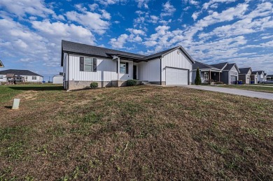 Discover modern comfort and effortless convenience in this on Franklin Country Club in Kentucky - for sale on GolfHomes.com, golf home, golf lot