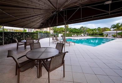 Under contract-accepting backup offers. Located in the gated on Longboat Key Golf Club Resort in Florida - for sale on GolfHomes.com, golf home, golf lot