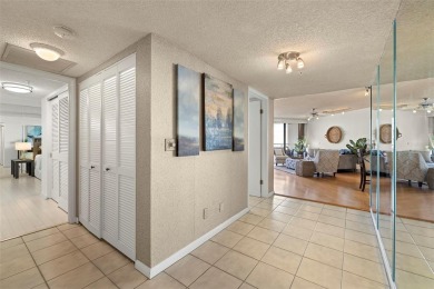 Lush tropical and water views await from this 12th floor condo on Pasadena Yacht and Country Club in Florida - for sale on GolfHomes.com, golf home, golf lot