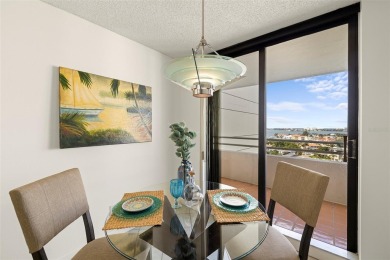 Lush tropical and water views await from this 12th floor condo on Pasadena Yacht and Country Club in Florida - for sale on GolfHomes.com, golf home, golf lot