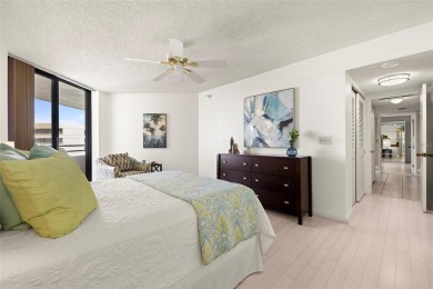 Lush tropical and water views await from this 12th floor condo on Pasadena Yacht and Country Club in Florida - for sale on GolfHomes.com, golf home, golf lot