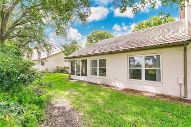 Charming 3-Bedroom Townhouse in Southern Dunes Golf Community - on Southern Dunes Golf and Country Club in Florida - for sale on GolfHomes.com, golf home, golf lot