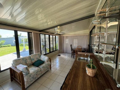 This home is set up to enjoy the Florida lifestyle! This on Lake Henry Golf Club in Florida - for sale on GolfHomes.com, golf home, golf lot