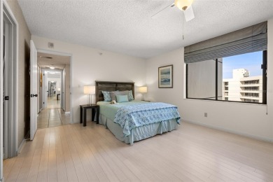 Lush tropical and water views await from this 12th floor condo on Pasadena Yacht and Country Club in Florida - for sale on GolfHomes.com, golf home, golf lot