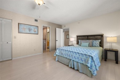 Lush tropical and water views await from this 12th floor condo on Pasadena Yacht and Country Club in Florida - for sale on GolfHomes.com, golf home, golf lot