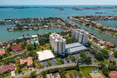 Lush tropical and water views await from this 12th floor condo on Pasadena Yacht and Country Club in Florida - for sale on GolfHomes.com, golf home, golf lot