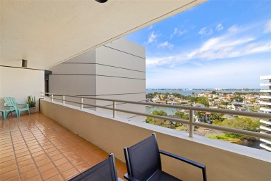 Lush tropical and water views await from this 12th floor condo on Pasadena Yacht and Country Club in Florida - for sale on GolfHomes.com, golf home, golf lot