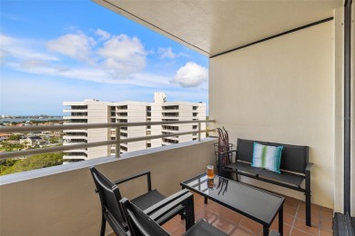 Lush tropical and water views await from this 12th floor condo on Pasadena Yacht and Country Club in Florida - for sale on GolfHomes.com, golf home, golf lot