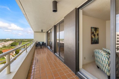 Lush tropical and water views await from this 12th floor condo on Pasadena Yacht and Country Club in Florida - for sale on GolfHomes.com, golf home, golf lot