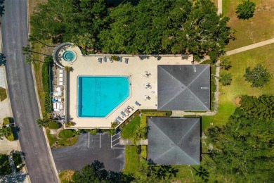 Lush tropical and water views await from this 12th floor condo on Pasadena Yacht and Country Club in Florida - for sale on GolfHomes.com, golf home, golf lot