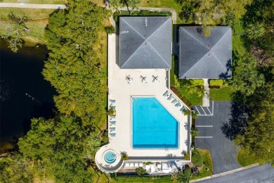 Lush tropical and water views await from this 12th floor condo on Pasadena Yacht and Country Club in Florida - for sale on GolfHomes.com, golf home, golf lot