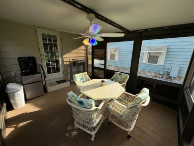 This home is set up to enjoy the Florida lifestyle! This on Lake Henry Golf Club in Florida - for sale on GolfHomes.com, golf home, golf lot