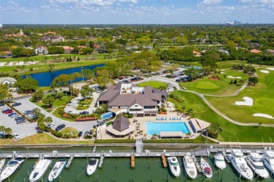 Lush tropical and water views await from this 12th floor condo on Pasadena Yacht and Country Club in Florida - for sale on GolfHomes.com, golf home, golf lot