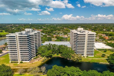 Lush tropical and water views await from this 12th floor condo on Pasadena Yacht and Country Club in Florida - for sale on GolfHomes.com, golf home, golf lot