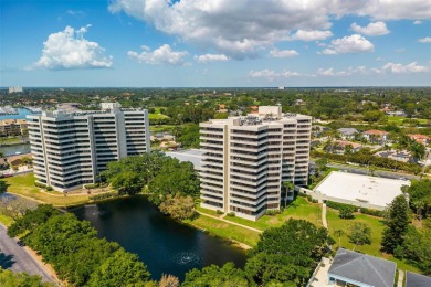 Lush tropical and water views await from this 12th floor condo on Pasadena Yacht and Country Club in Florida - for sale on GolfHomes.com, golf home, golf lot