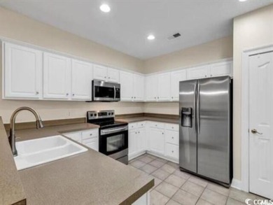 #321 The Woodlands is a gorgeous 3-bedroom, 3 full-bath on Barefoot Resort and Golf Club  in South Carolina - for sale on GolfHomes.com, golf home, golf lot