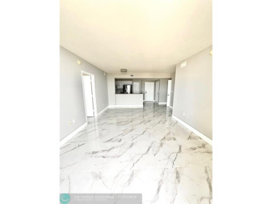 GORGEOUS UNIT AT TURNBERRY ON THE GREEN OVERLOOKING THE CITY OF on Turnberry Isle Resort and Club in Florida - for sale on GolfHomes.com, golf home, golf lot