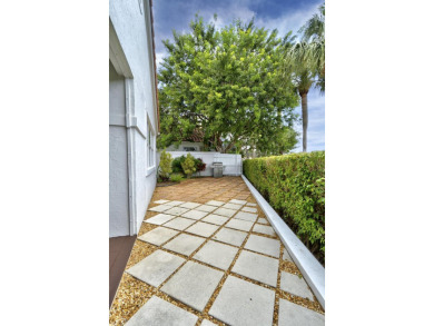 Spectacular model perfect 3/2 single story home on 10th hole of on The Boca Country Club in Florida - for sale on GolfHomes.com, golf home, golf lot