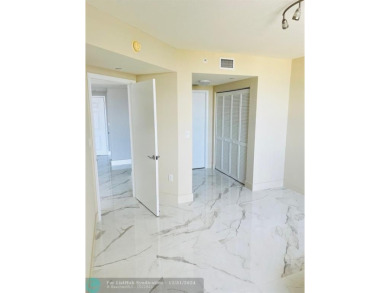 GORGEOUS UNIT AT TURNBERRY ON THE GREEN OVERLOOKING THE CITY OF on Turnberry Isle Resort and Club in Florida - for sale on GolfHomes.com, golf home, golf lot