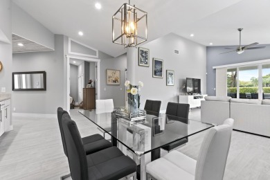 Spectacular model perfect 3/2 single story home on 10th hole of on The Boca Country Club in Florida - for sale on GolfHomes.com, golf home, golf lot