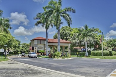 Spectacular model perfect 3/2 single story home on 10th hole of on The Boca Country Club in Florida - for sale on GolfHomes.com, golf home, golf lot