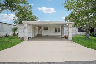 I present a beautifully renovated split floor plan two-bedroom on The Meadows At Countrywood in Florida - for sale on GolfHomes.com, golf home, golf lot