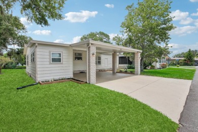 I present a beautifully renovated split floor plan two-bedroom on The Meadows At Countrywood in Florida - for sale on GolfHomes.com, golf home, golf lot