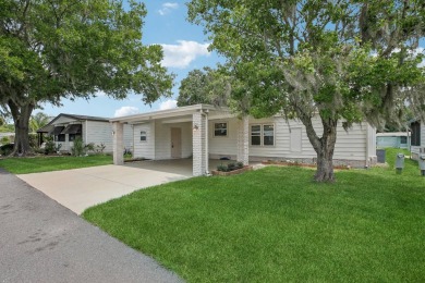 I present a beautifully renovated split floor plan two-bedroom on The Meadows At Countrywood in Florida - for sale on GolfHomes.com, golf home, golf lot