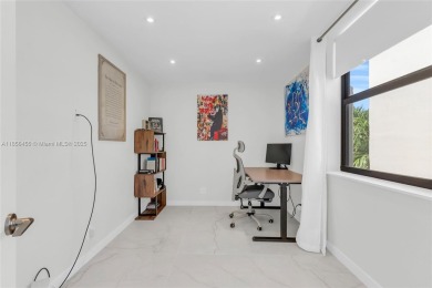 Step into modern elegance with this beautifully renovated on Turnberry Isle Resort and Club in Florida - for sale on GolfHomes.com, golf home, golf lot