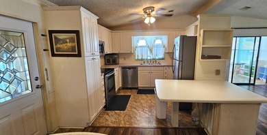 Spacious 2 bedroom 2 bath home in 55 + Resort style community in on Zephyrhills Municipal Golf Course in Florida - for sale on GolfHomes.com, golf home, golf lot