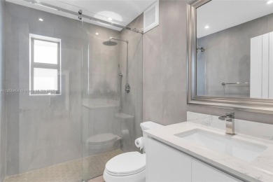 Step into modern elegance with this beautifully renovated on Turnberry Isle Resort and Club in Florida - for sale on GolfHomes.com, golf home, golf lot