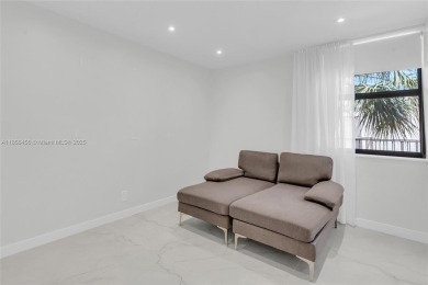 Step into modern elegance with this beautifully renovated on Turnberry Isle Resort and Club in Florida - for sale on GolfHomes.com, golf home, golf lot