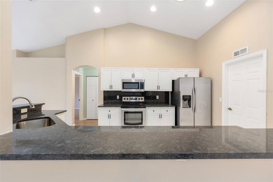 Under contract-accepting backup offers. Pool home with golf on Stonecrest Golf and Club Club in Florida - for sale on GolfHomes.com, golf home, golf lot