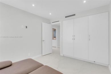 Step into modern elegance with this beautifully renovated on Turnberry Isle Resort and Club in Florida - for sale on GolfHomes.com, golf home, golf lot