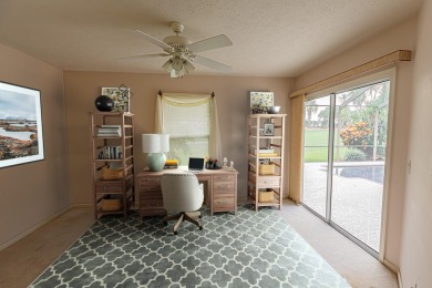 Welcome to this stunning 3/2/2 pool home nestled in sought after on St. Lucie Trail Golf Club in Florida - for sale on GolfHomes.com, golf home, golf lot