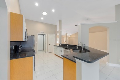 Under contract-accepting backup offers. Pool home with golf on Stonecrest Golf and Club Club in Florida - for sale on GolfHomes.com, golf home, golf lot