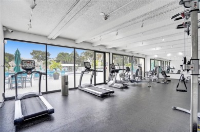 Step into modern elegance with this beautifully renovated on Turnberry Isle Resort and Club in Florida - for sale on GolfHomes.com, golf home, golf lot
